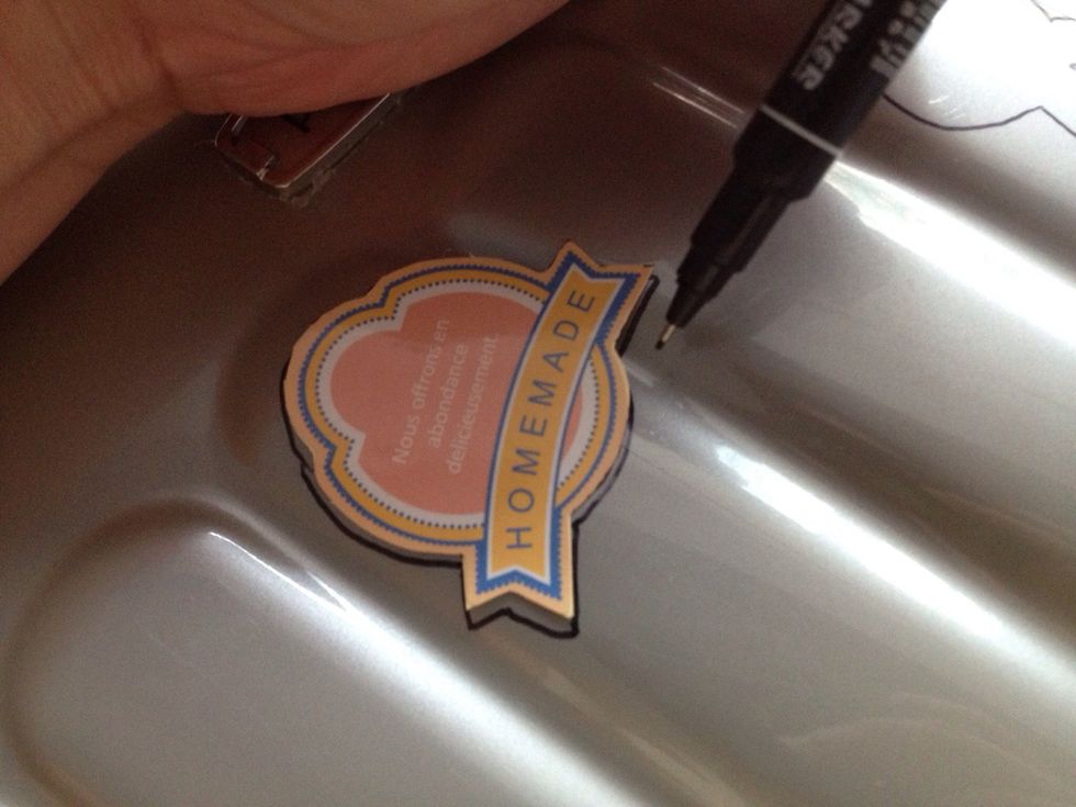 Draw the outline with an oil pen first.