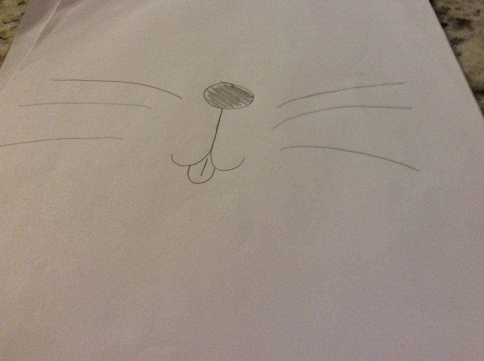 Draw the tongue and whiskers.