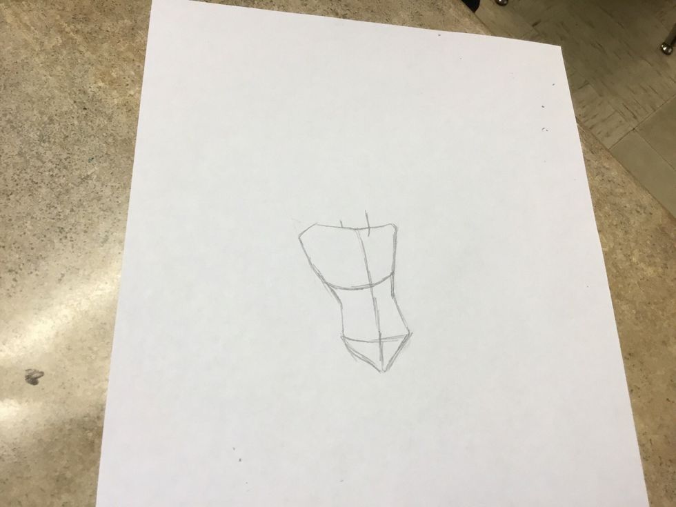 Draw the torso by drawing and upside trapezoid as the chest, add a rectangle below as the waist