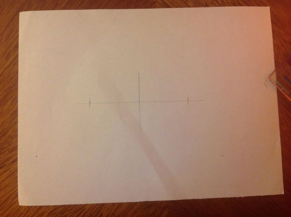Draw to lines to narrow the width of the mouth. I have draw them to 4 cm from the vertical line. This is just the sketch, then you can modify the width and tall of each lip.