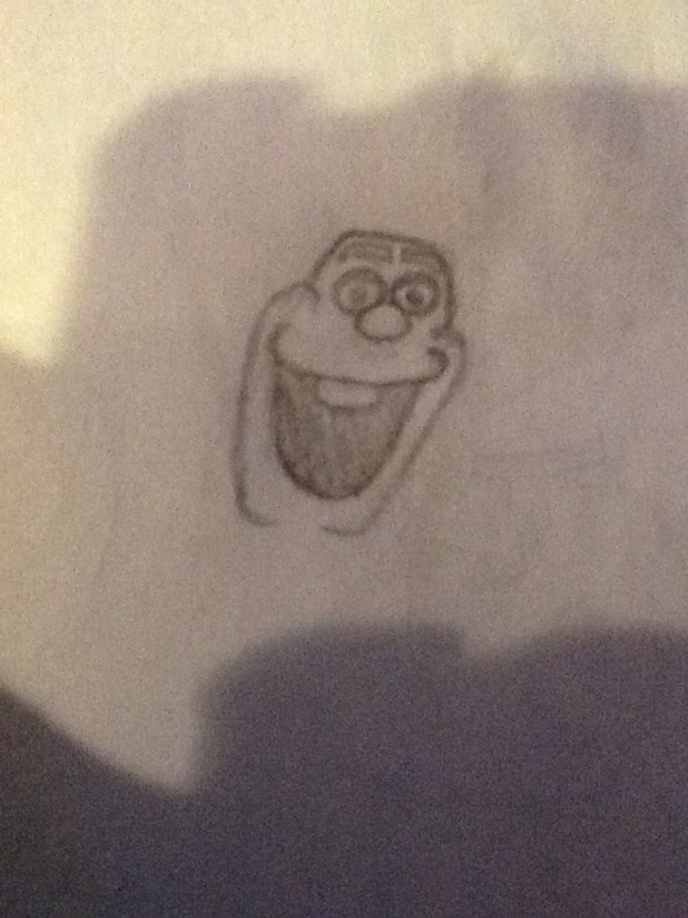 Draw two eyebrows over his eyes then lightly shade them in