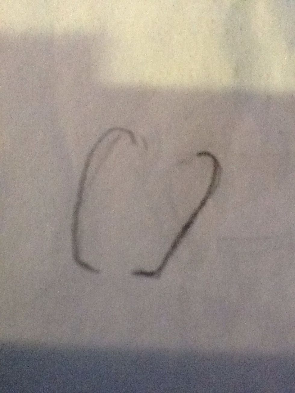 Draw two hooked lines for his cheeks