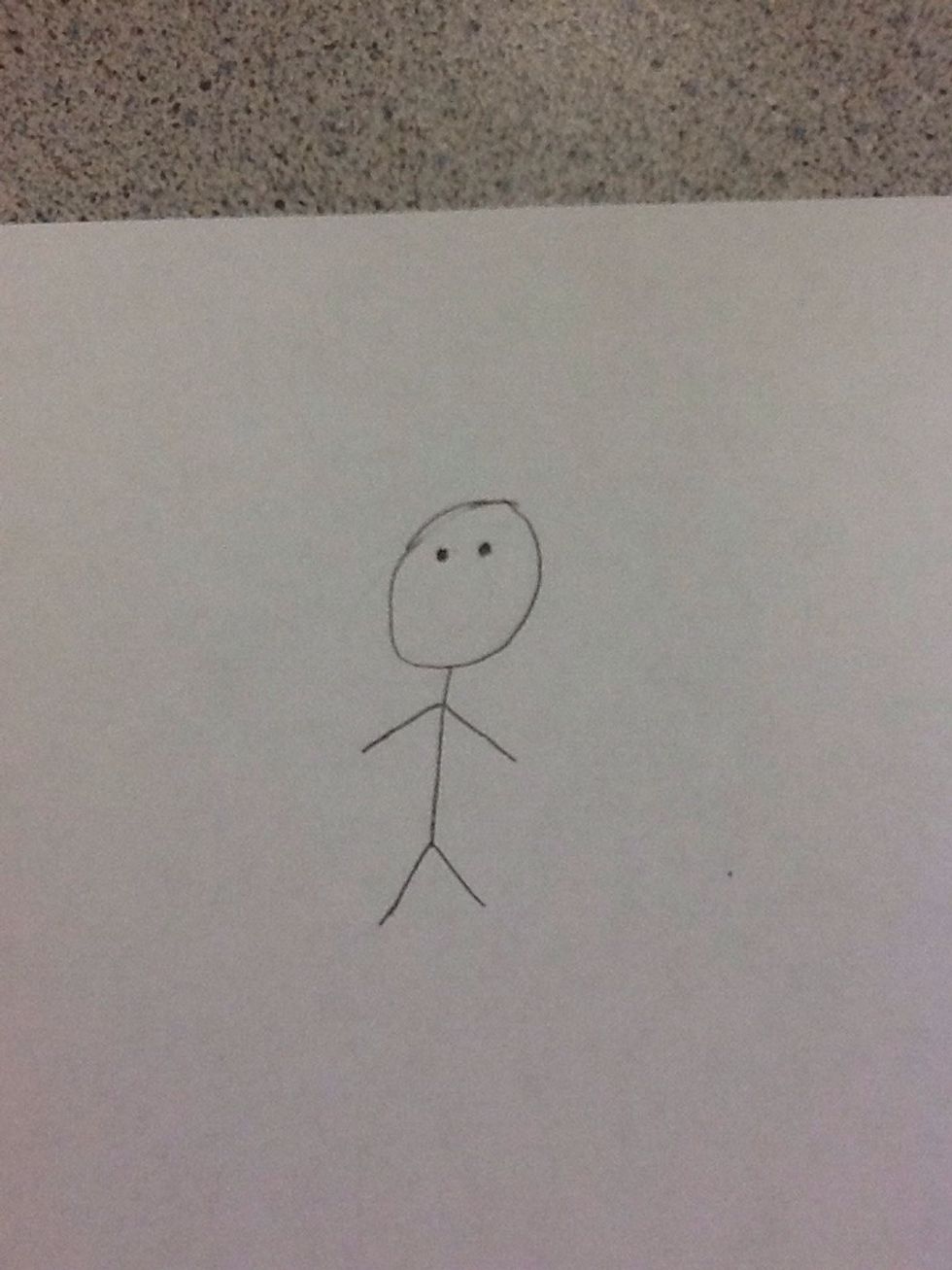 Draw two little dots inside of the big circle for eyes.