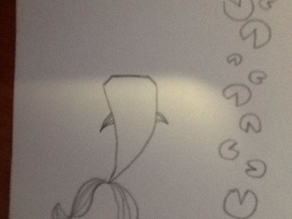 Draw two side fins on either side of the koi or else it will look like "a carrot" - M.L