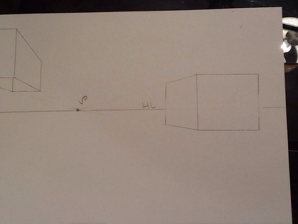 Draw you parallel vertical line to create the side of you box. Erase your lines.