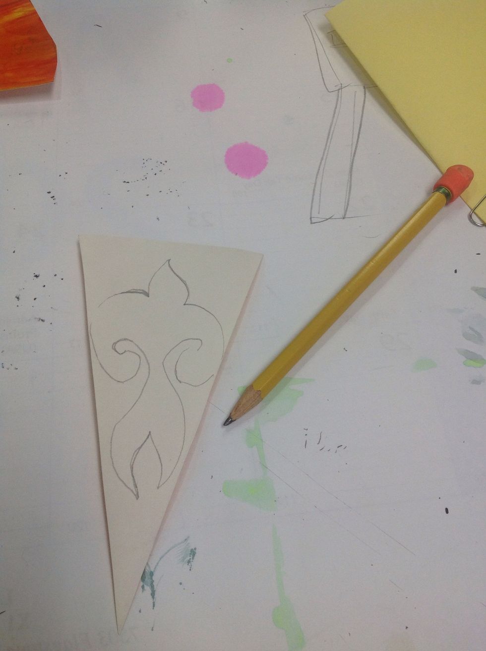 Draw your chosen shape on the back of that piece. Cut it out. Numbers and letters will be reversed.