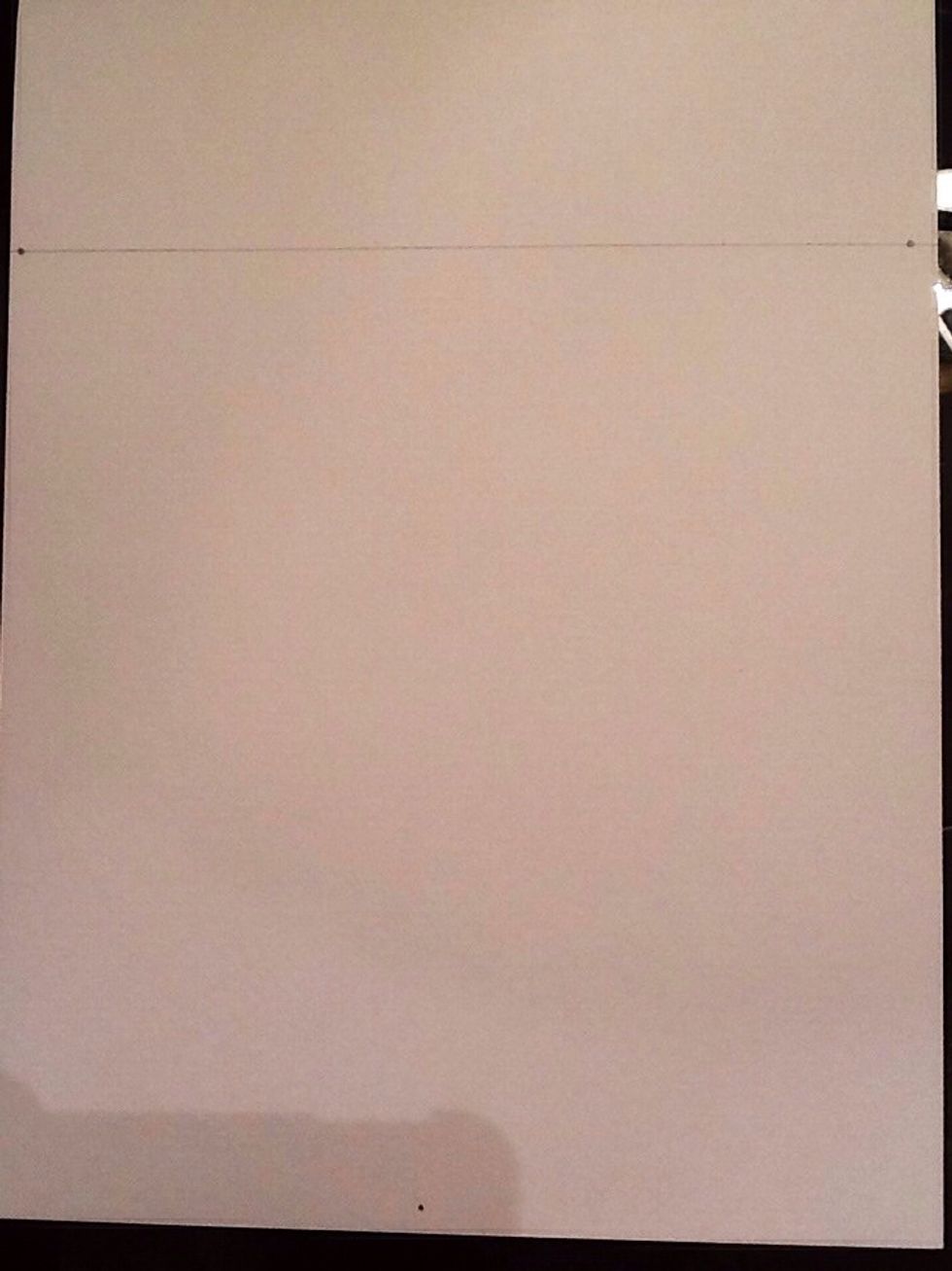 Draw your horizon line a couple of inches from the top or bottom of the paper with 2 vanishing points at each end. Draw your 3rd vanishing point at the opposite end of the page.