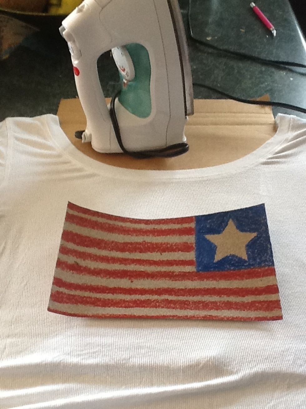Draw your image on the sandpaper. Any uncolored parts will show shirt color. Remember to reverse image so it faces the right way
