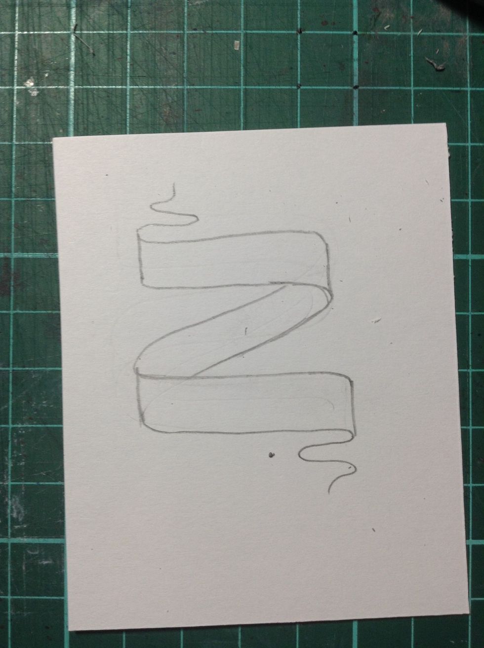 Drawing in little squiggly lines at the top and bottom