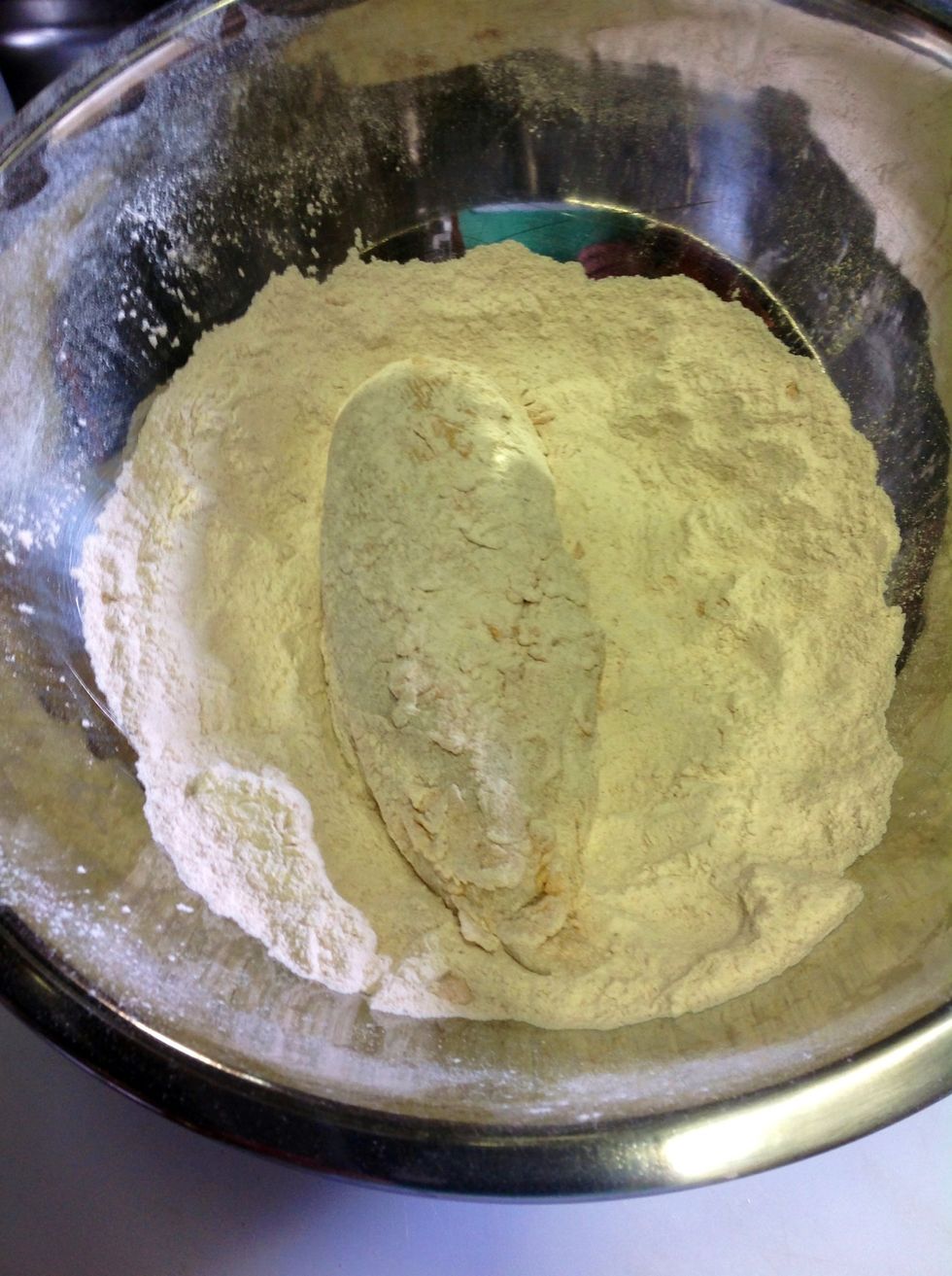 Dredge chicken in seasoned flour.