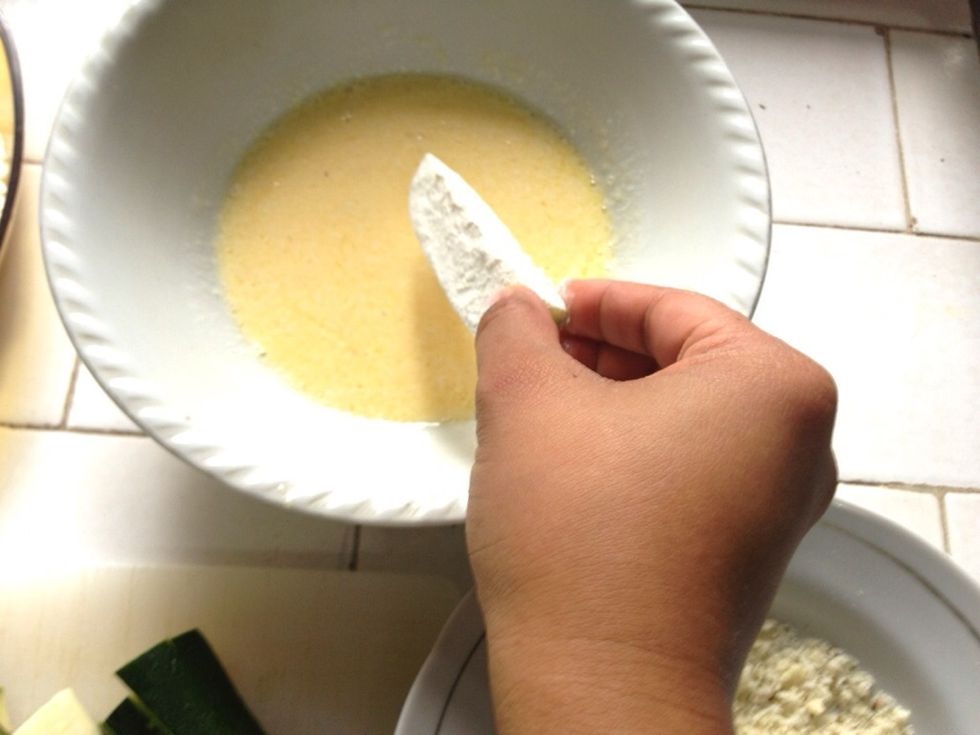 Dredge in the buttermilk and egg mixture