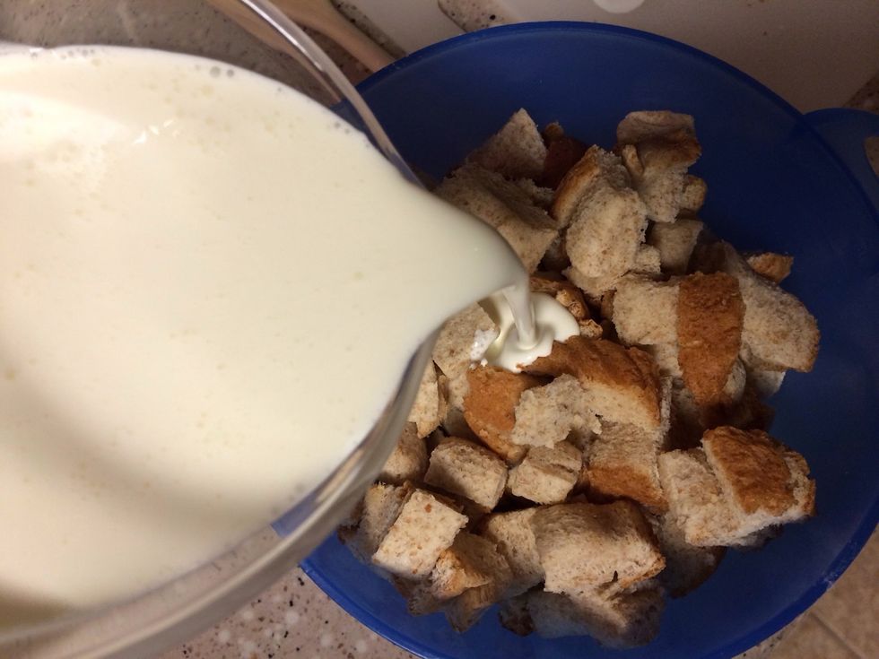 Drench cubed bread with heavy cream