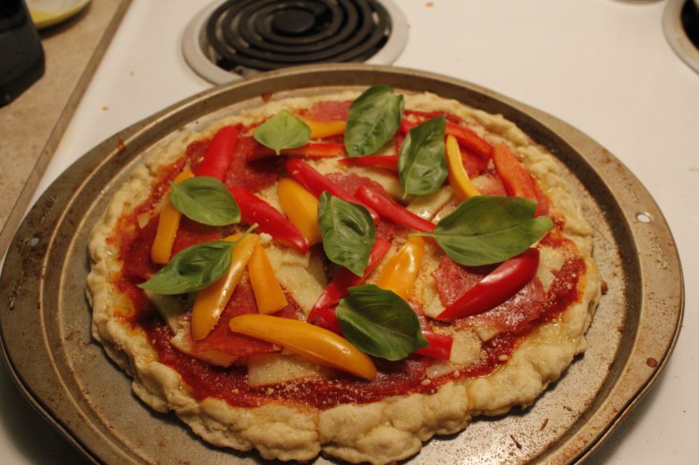 Dress pizza and bake for another 7-10 minutes.