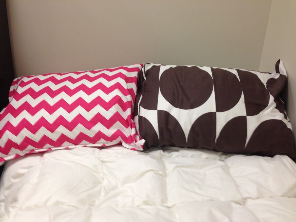 Dress up your pillows with bright colored and patterned shams/ pillow cases