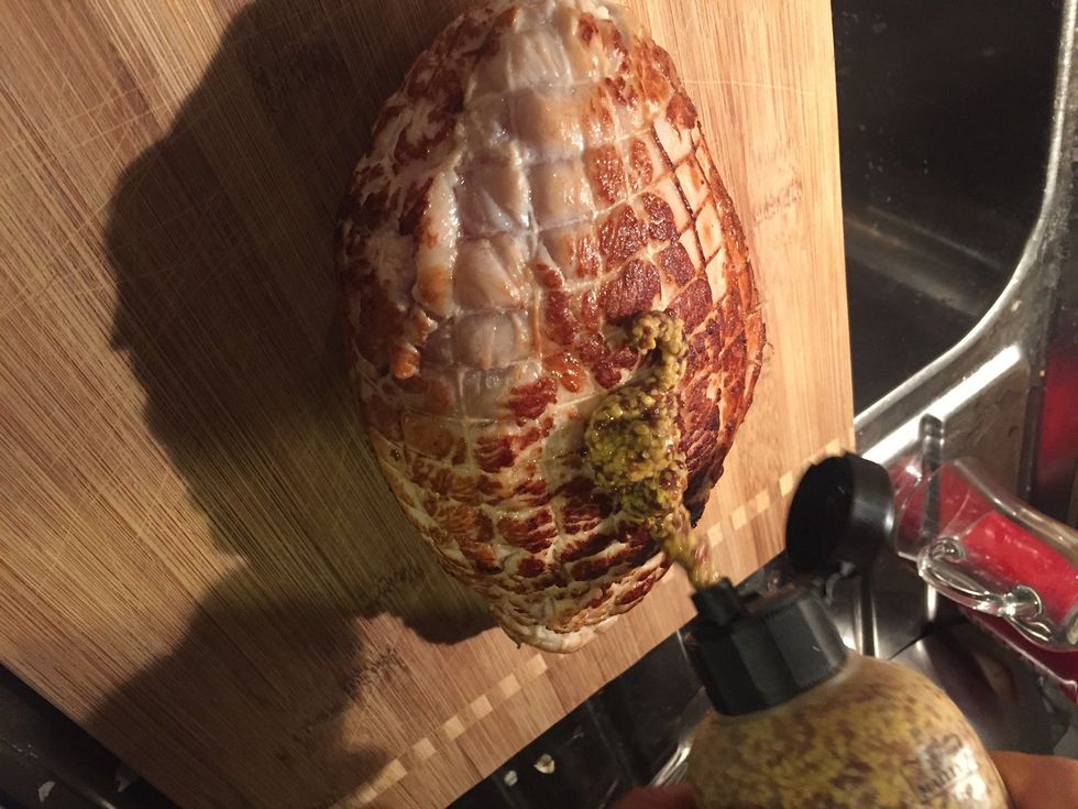 Dress your turkey with some mustard before baking it
