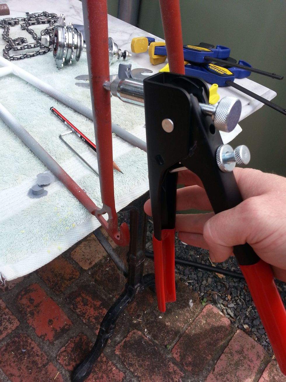 Drill a 7mm hole perpendicular to hub axle and locate M5 steel nutsert. Note: measure and check more than twice! You have one shot here.