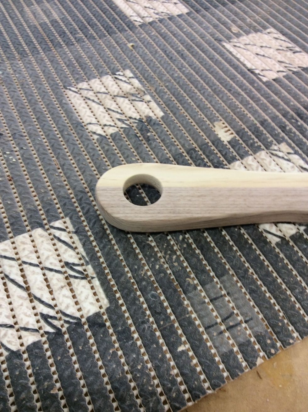 Drill hole in the top of the pizza padal and sand till smooth