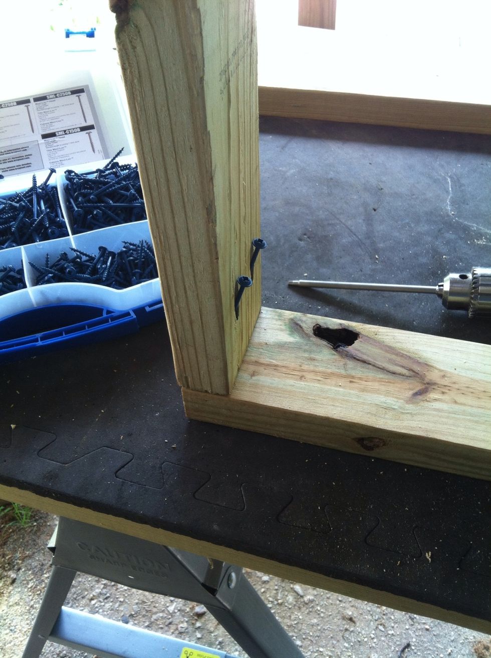 Drill in the decking screws.