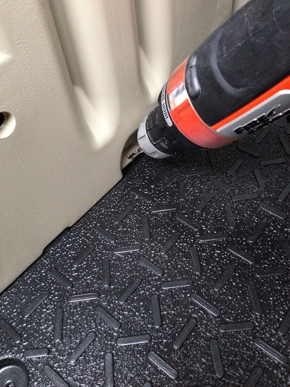 Drill pilot holes in the 4 places along the bottom.