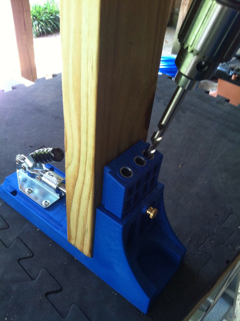 Drill two holes per side (4 total) on the two smaller boards. These will be facing the inside.