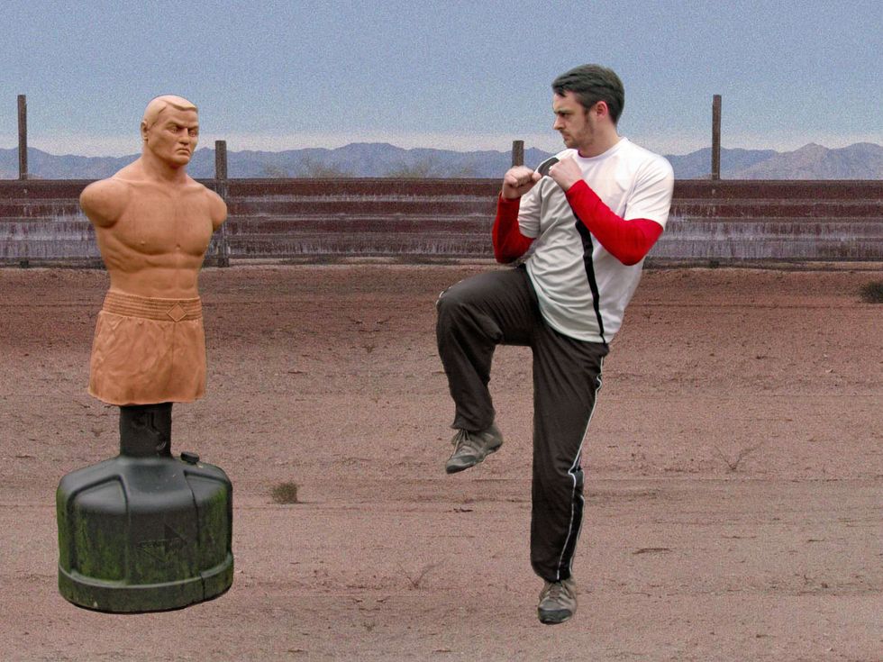 Drive the rear leg up and across the body slightly so that it is tucked like a wing. Keep the body upright, with your weight on the standing foot for balance.