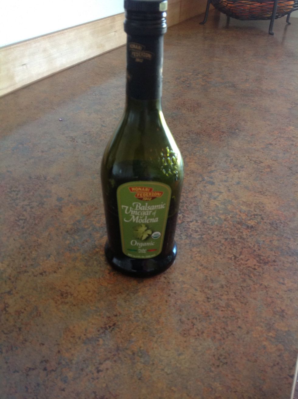 Drizzle balsamic vinaigrette over salad and toss until the salad is coated.