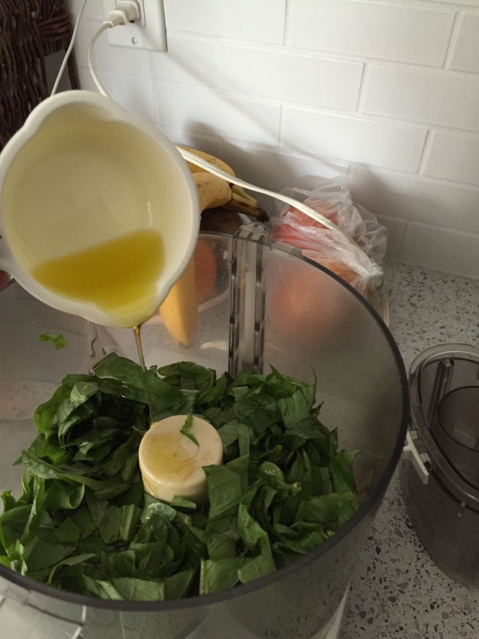 Drizzle in 1/2 cup olive oil