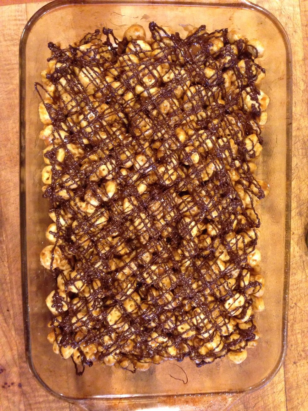 Drizzle it criss cross on your bars! Refrigerate for another hr or so.
