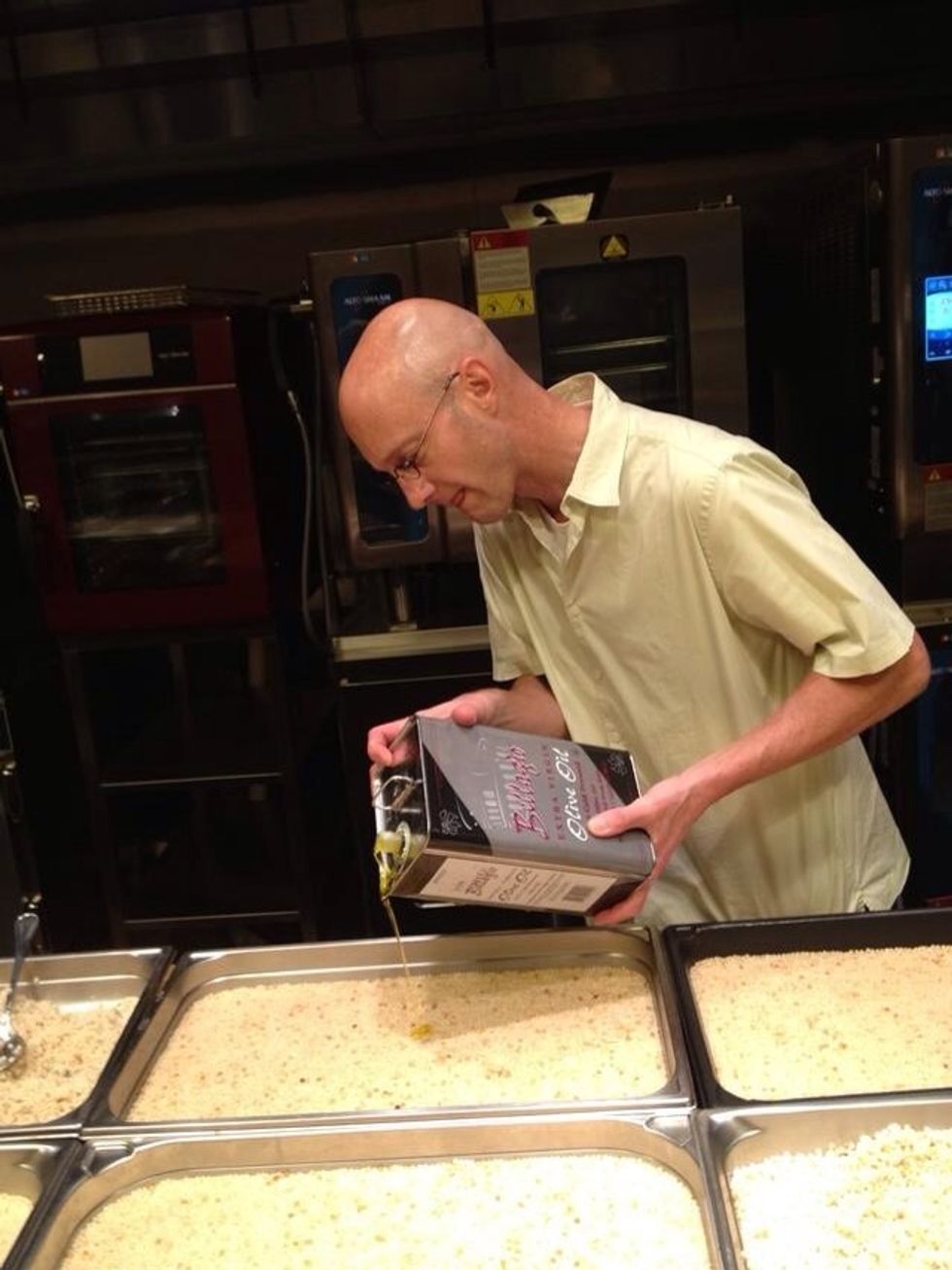 Drizzle olive oil into each pan