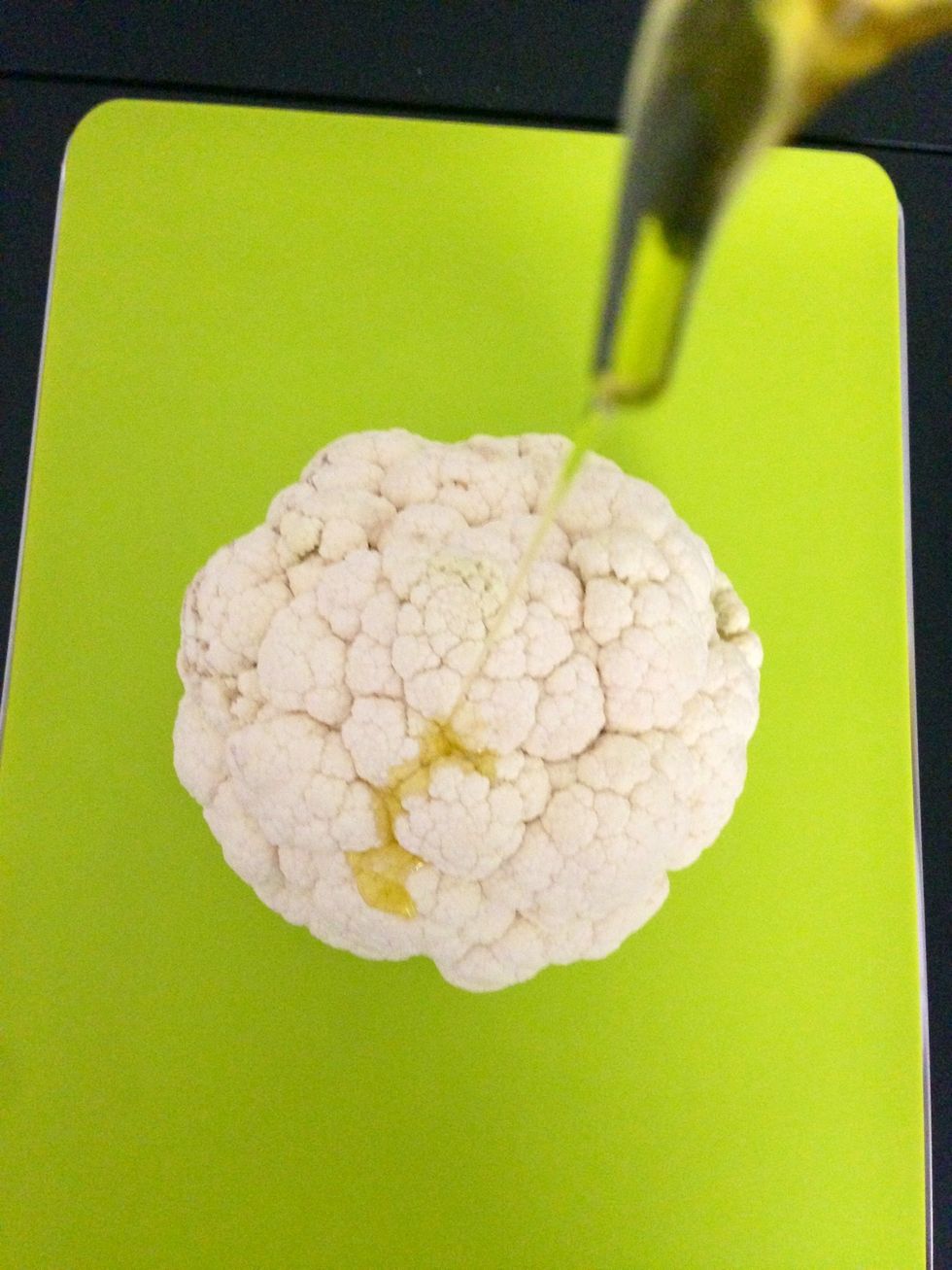 Drizzle olive oil on the cauliflower. Turning it around to get the oil penetrate among the florets. And put it in a cold oven at 130 C 2 hours. Drizzle on it more oil after 1 hr. not to worry ...
