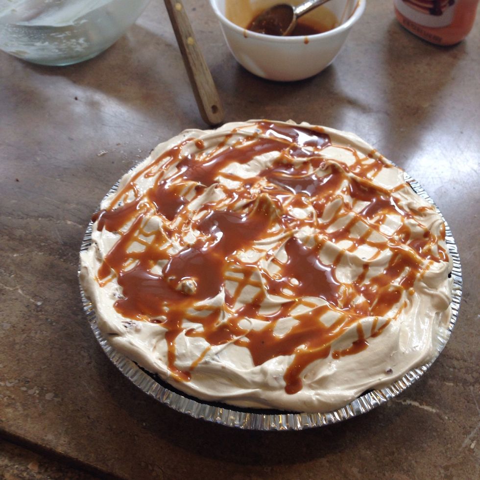 Drizzle remaining (2-3 tablespoons) of dulce de leche on top of pie. If you like, you can swirl it in with a knife.
