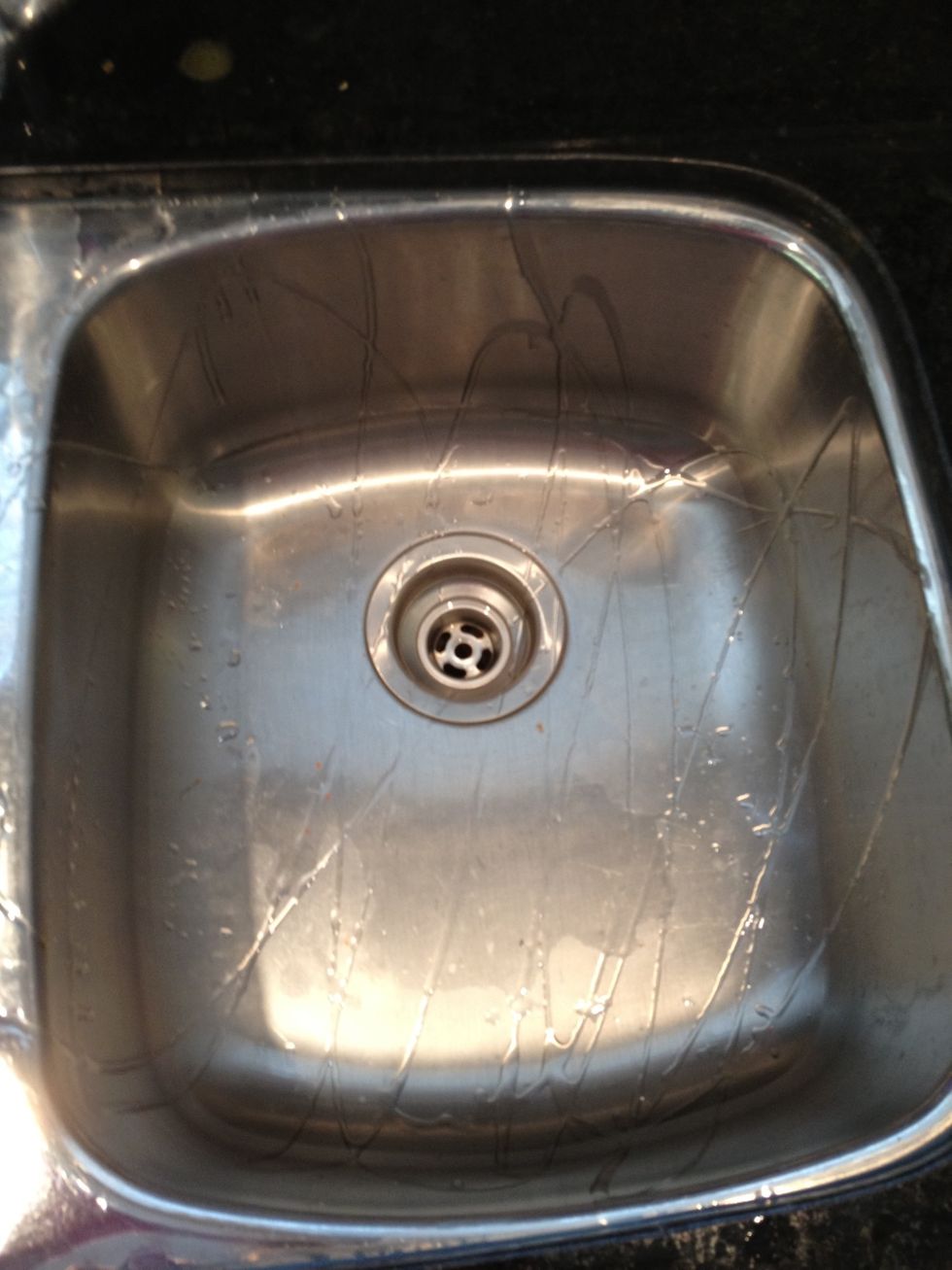 Drizzle some detergent over the sink