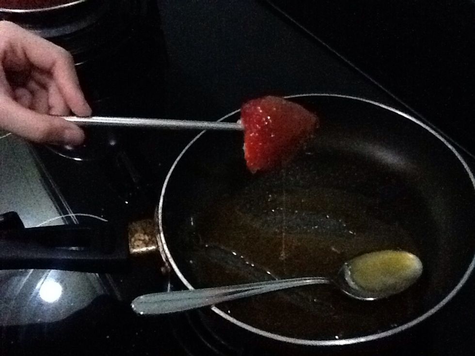 Drizzle the caramel over the strawberry