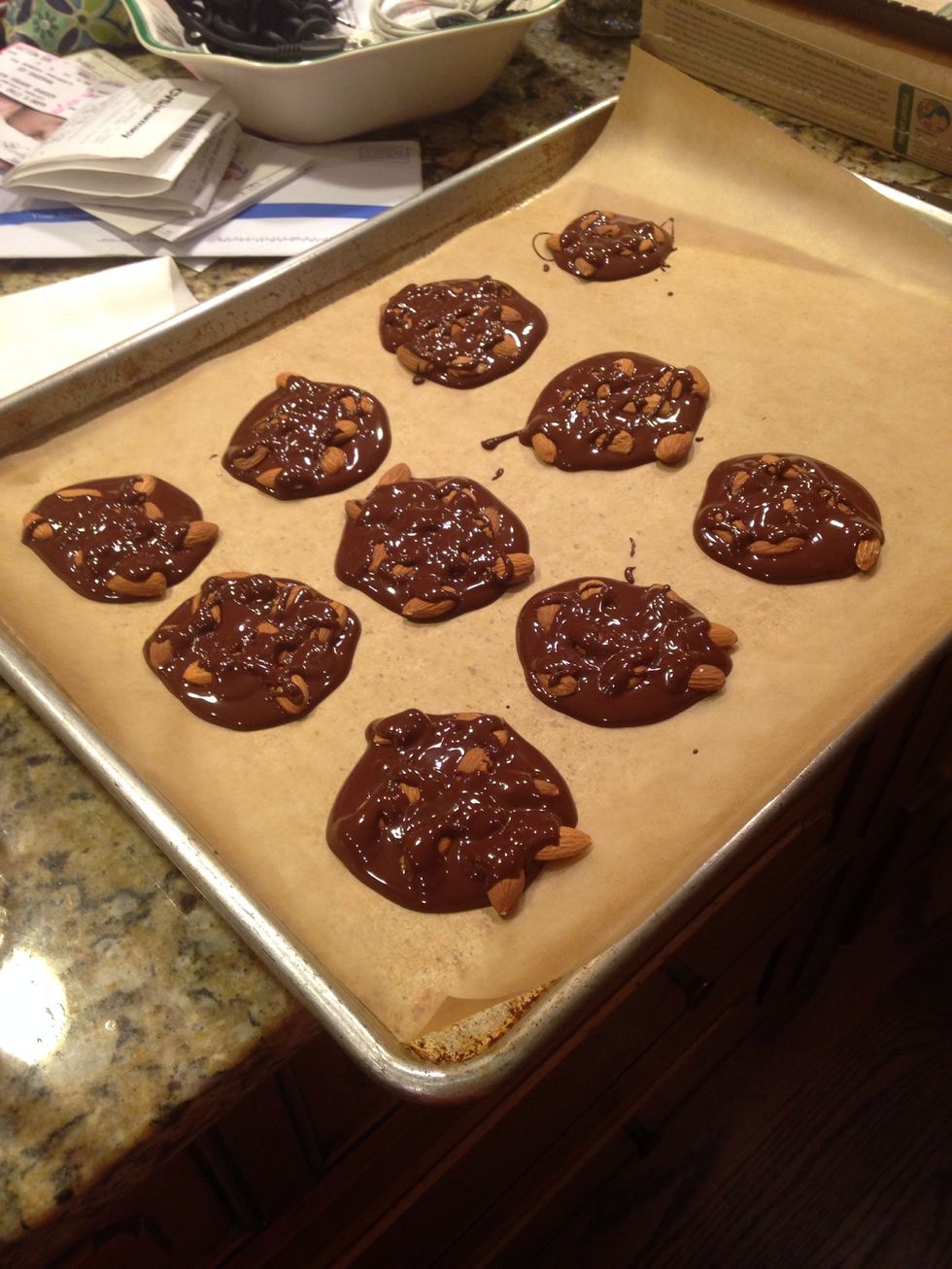Drizzle the chocolate on top. You can completely hide the almonds, but I think it's pretty when little bits show. Be artistic!