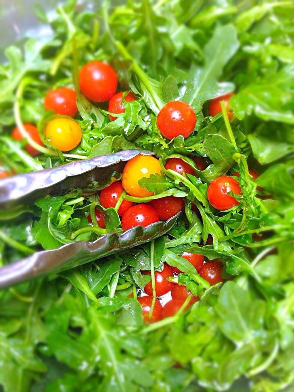 Drizzle the dressing over arugula salad and mix