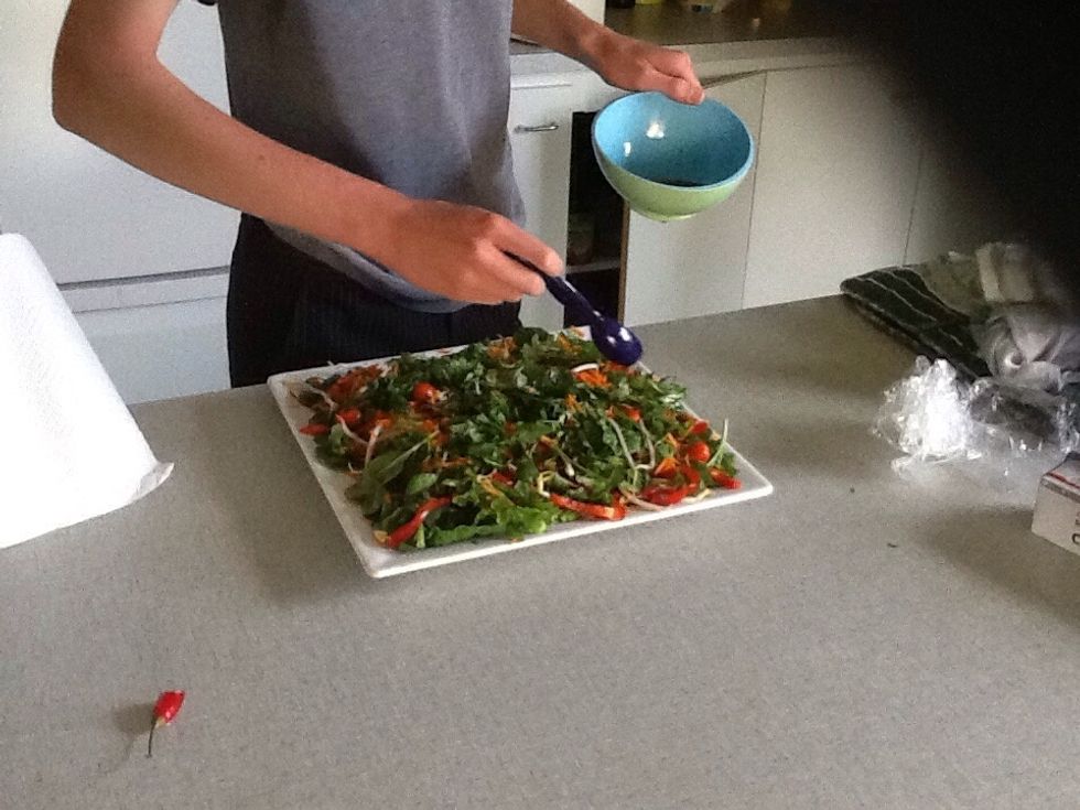 Drizzle the dressing over the salad platter.