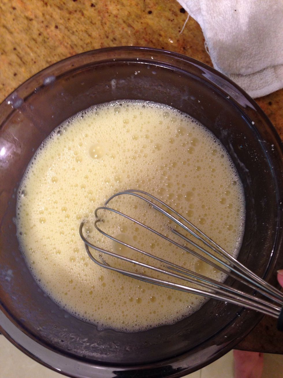 Drizzle the hot coconut milk mixture a little at a time into the egg mixture. Keep on whisking while you drizzle in the milk.