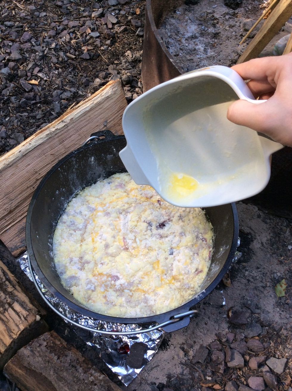 Drizzle the melted butter over the entire top of the cobbler.