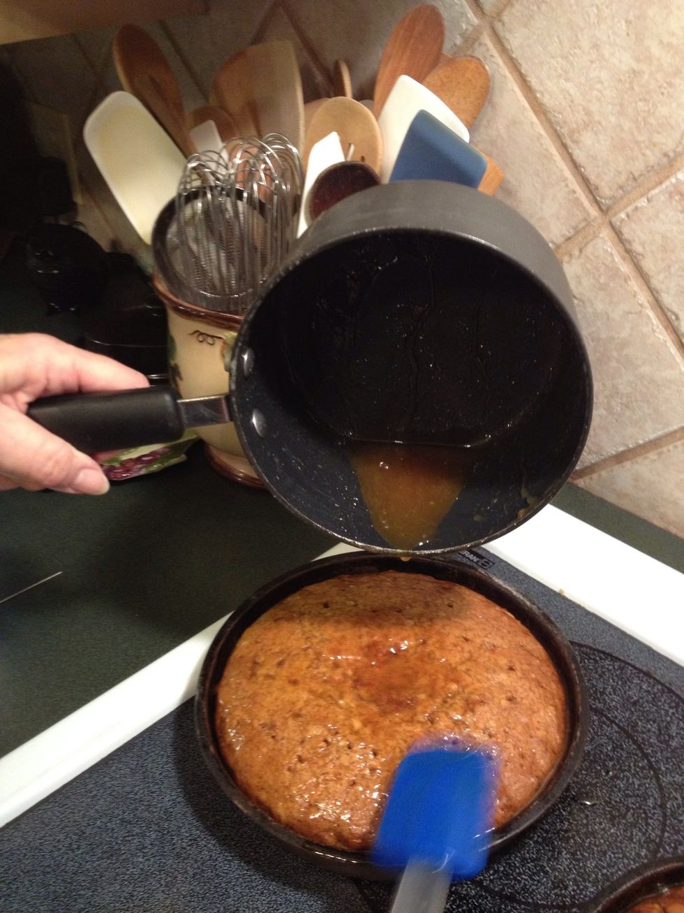 Drizzle warm glaze evenly over warm cake layers; cool in pans on wire racks 15 min. Remove from pans, inverting layers. Peel off wax paper; inverting again, glaze side up. Cool completely on racks.