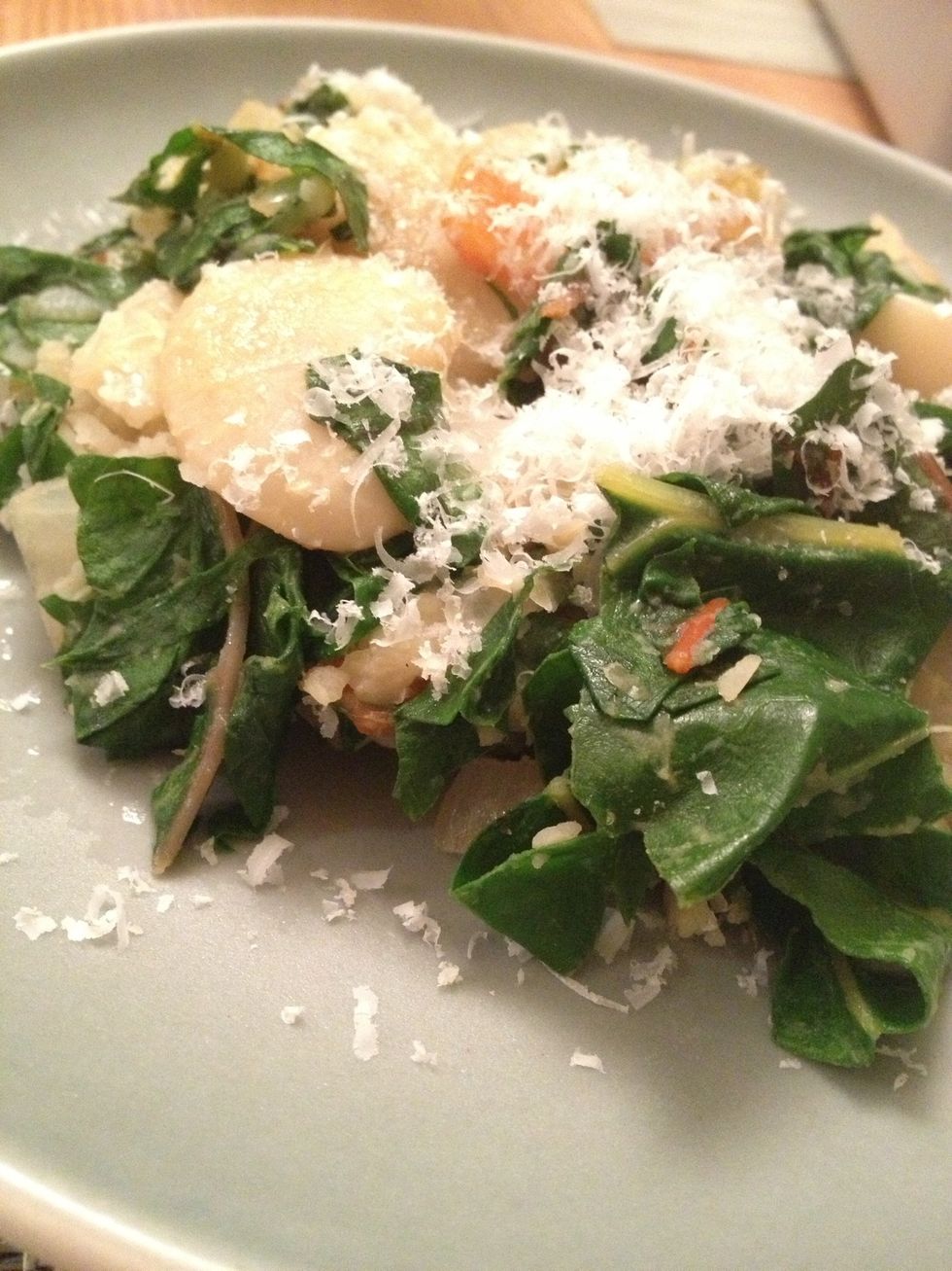 Drizzle with good quality olive oil and grate some Parmesan cheese on top.