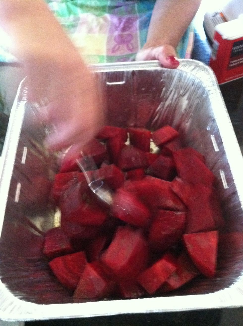 Drizzle with olive oil, add coarse salt, pepper and other seasonings to taste (we used parsley and sage!) an mix to combine.