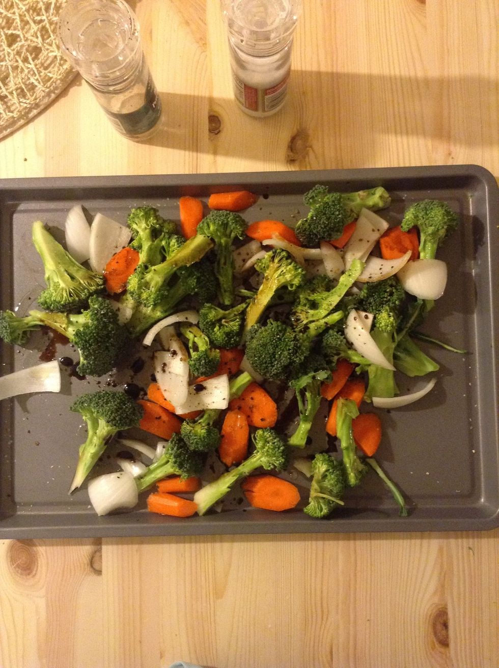 Drizzle with olive oil and balsamic vinegar. You don't need to add the vinegar. Sprinkle with a generous amount of salt and freshly ground pepper.