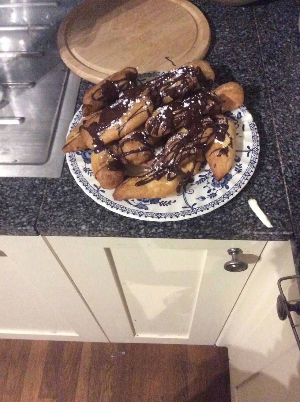 Drizzle your chocolate over the top and add some icing sugar