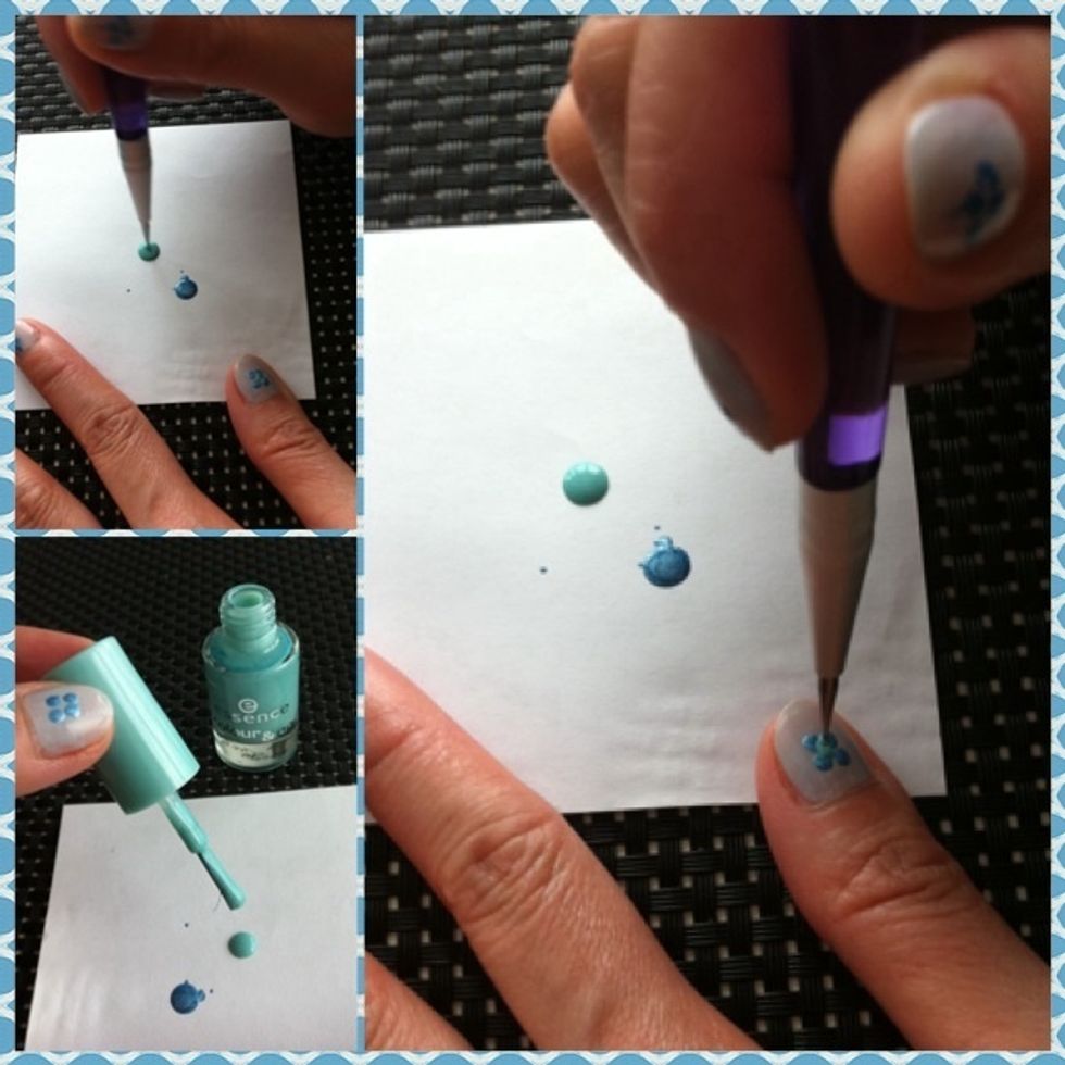 Drop a blob of the light blue colour on a piece of paper. Use dotter to dip into it.