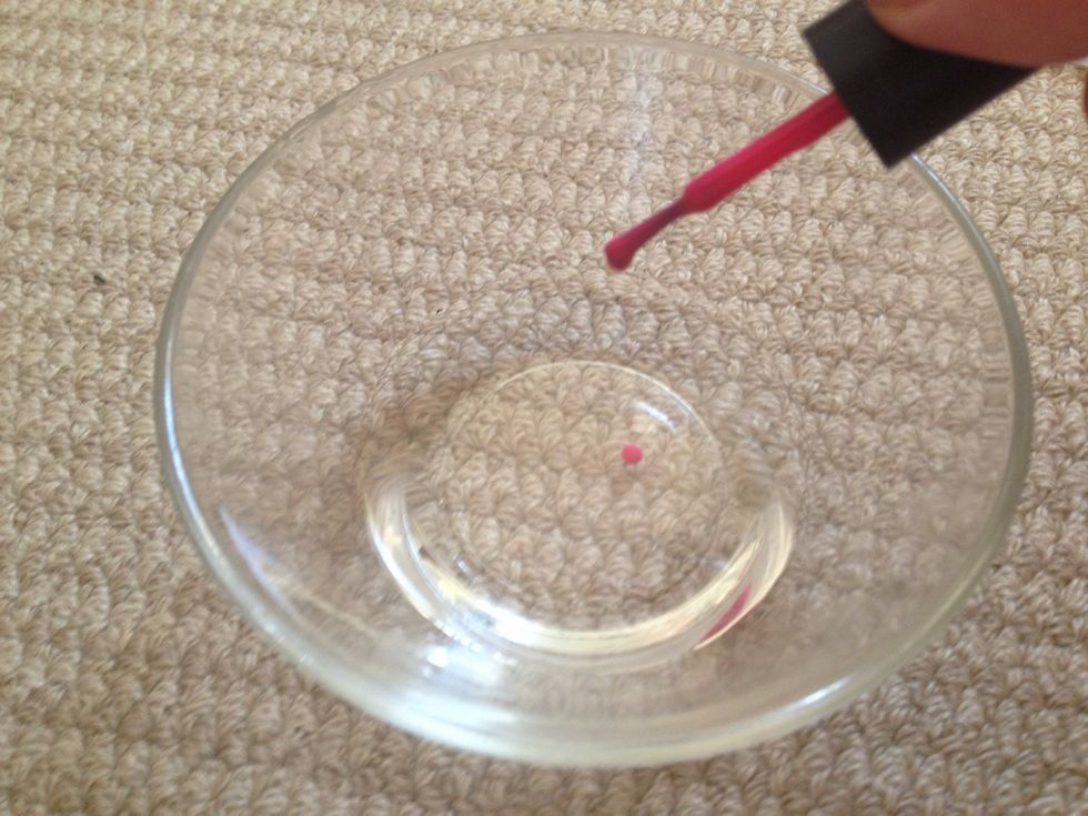 'Drop' a little of both of your other colour varnishes into the water. I've used blue and pink.
