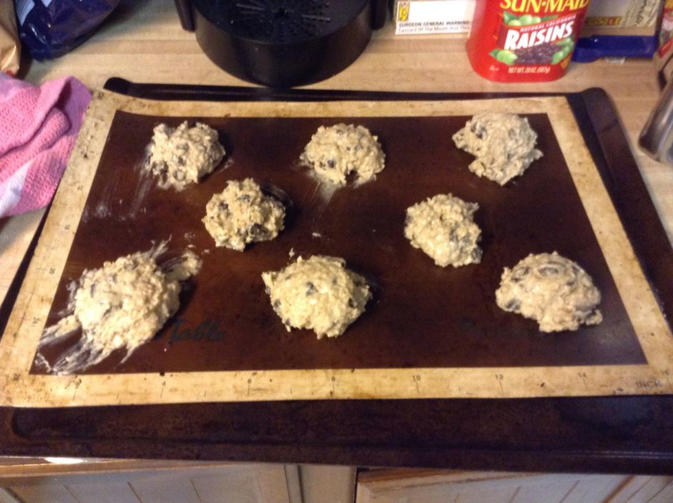 Drop a spoonful of dough onto an un greased cookie sheet. Bake for about 10-15 minutes or until edges are turning golden brown. Do not over bake. Cookies are to be moist!