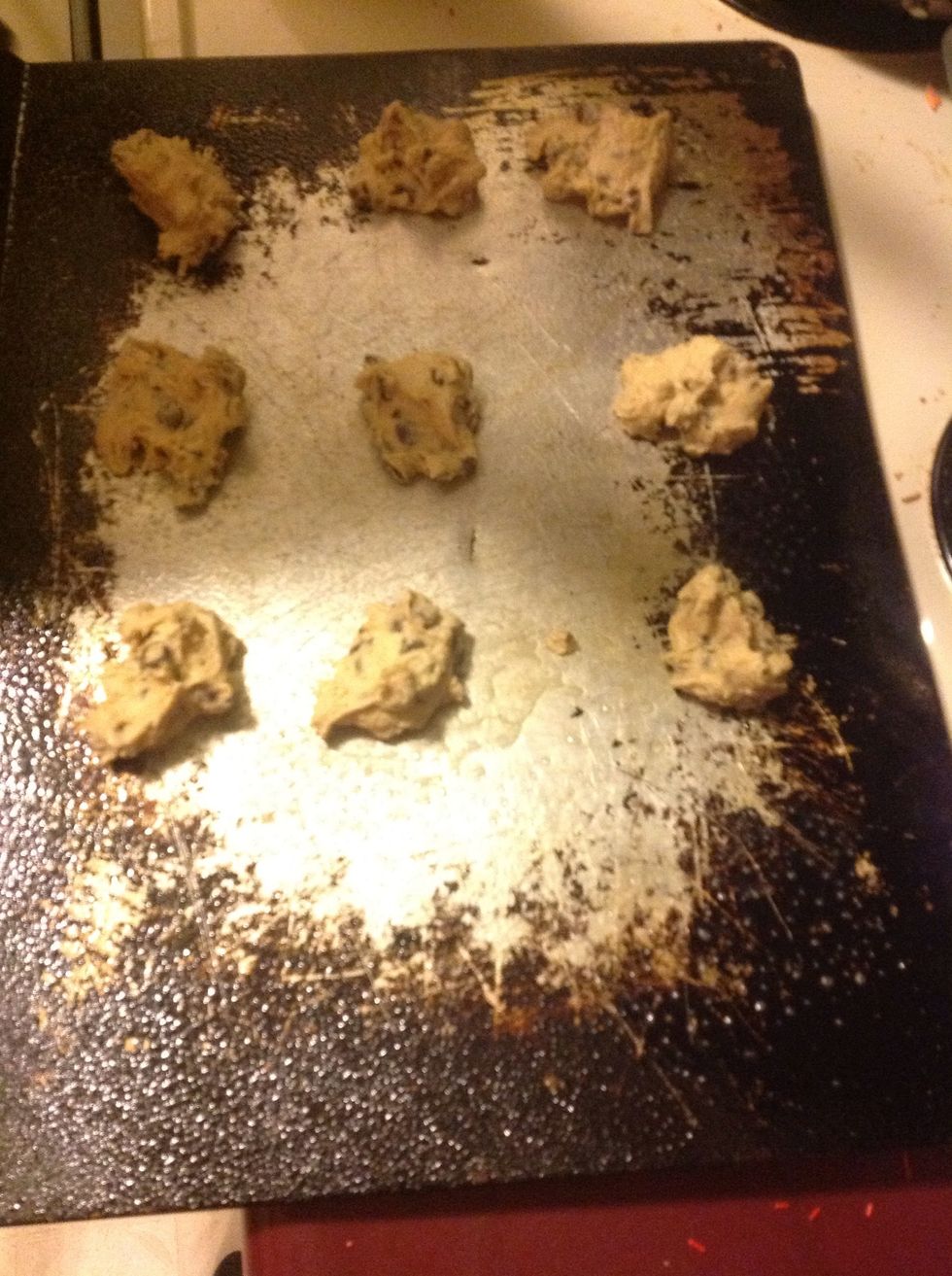 Drop a tablespoon of dough onto a greased cookie sheet
