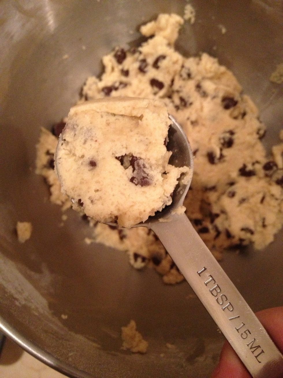 Drop cookie dough about 1 tablespoon at a time onto the prepared cookie sheets.