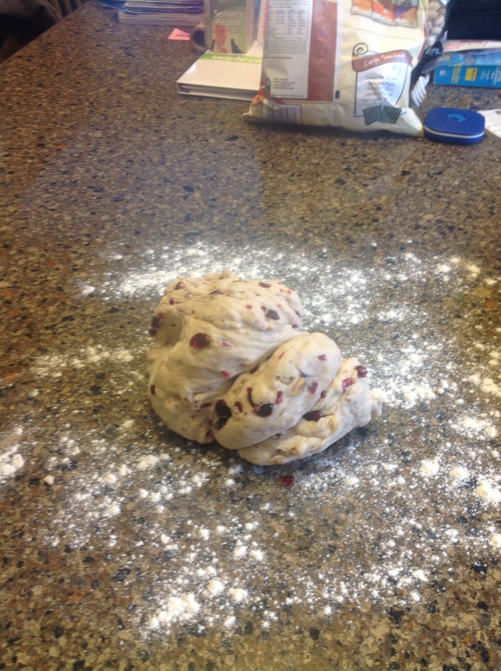 Drop dough on floured surface ...you can hand knead this for a sec to get it into rolling shape