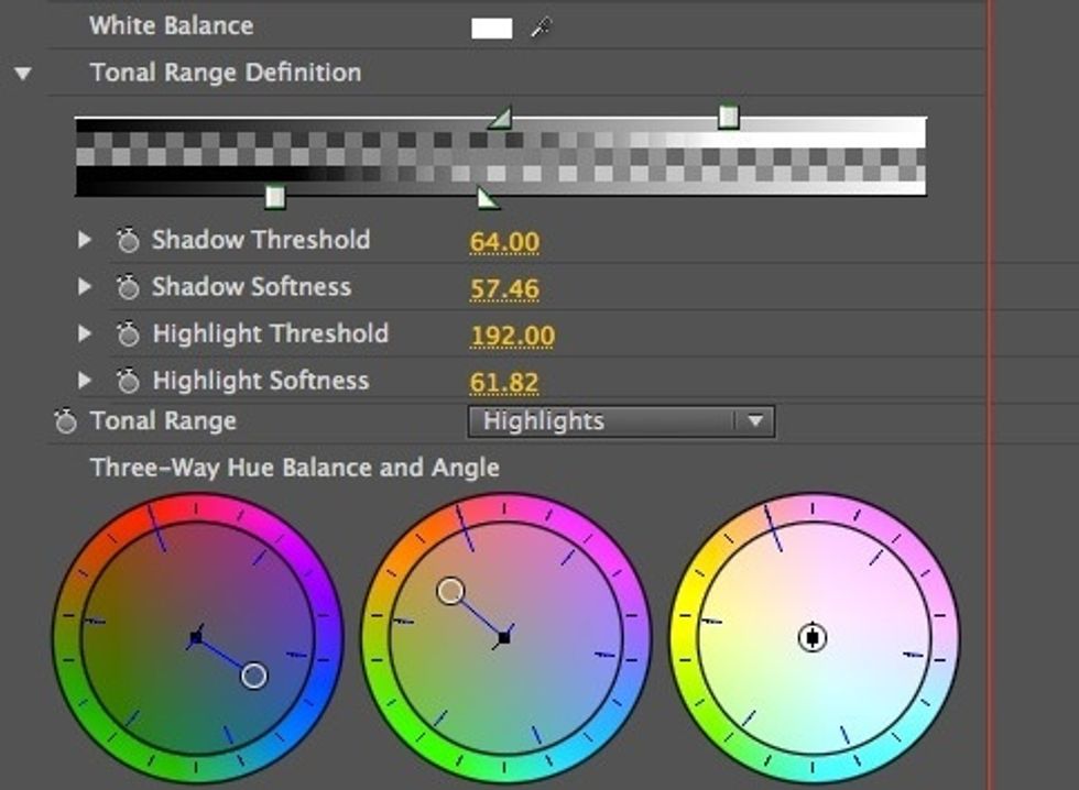 Drop down this option and drag the triangles toward the center. This blends the blue and orange effects together making them look natural.